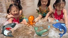 悠悠小朋友在青岛海边游泳玩沙子做城堡